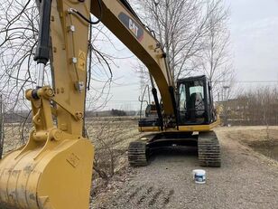 CAT 320 tracked excavator