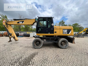 Caterpillar M318D wheel excavator